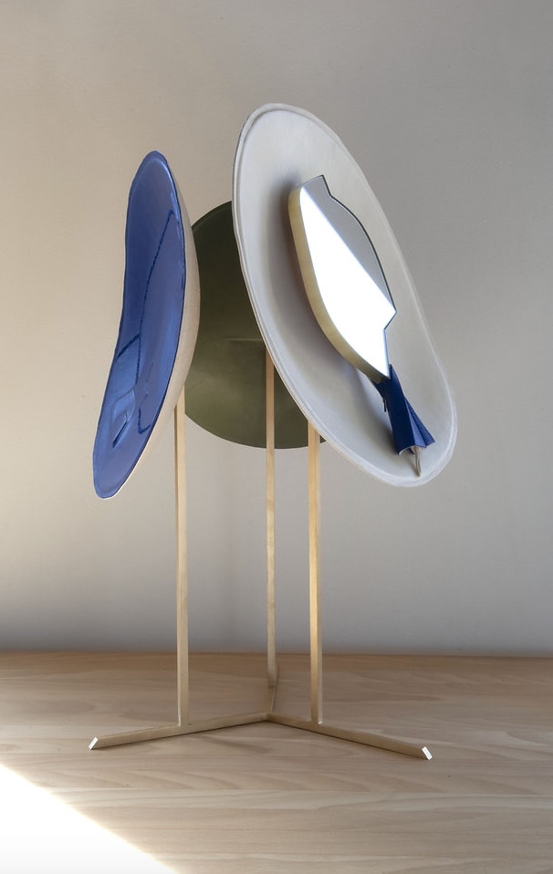 Marie Barthès, "ISO," leather, brass, and small mirror